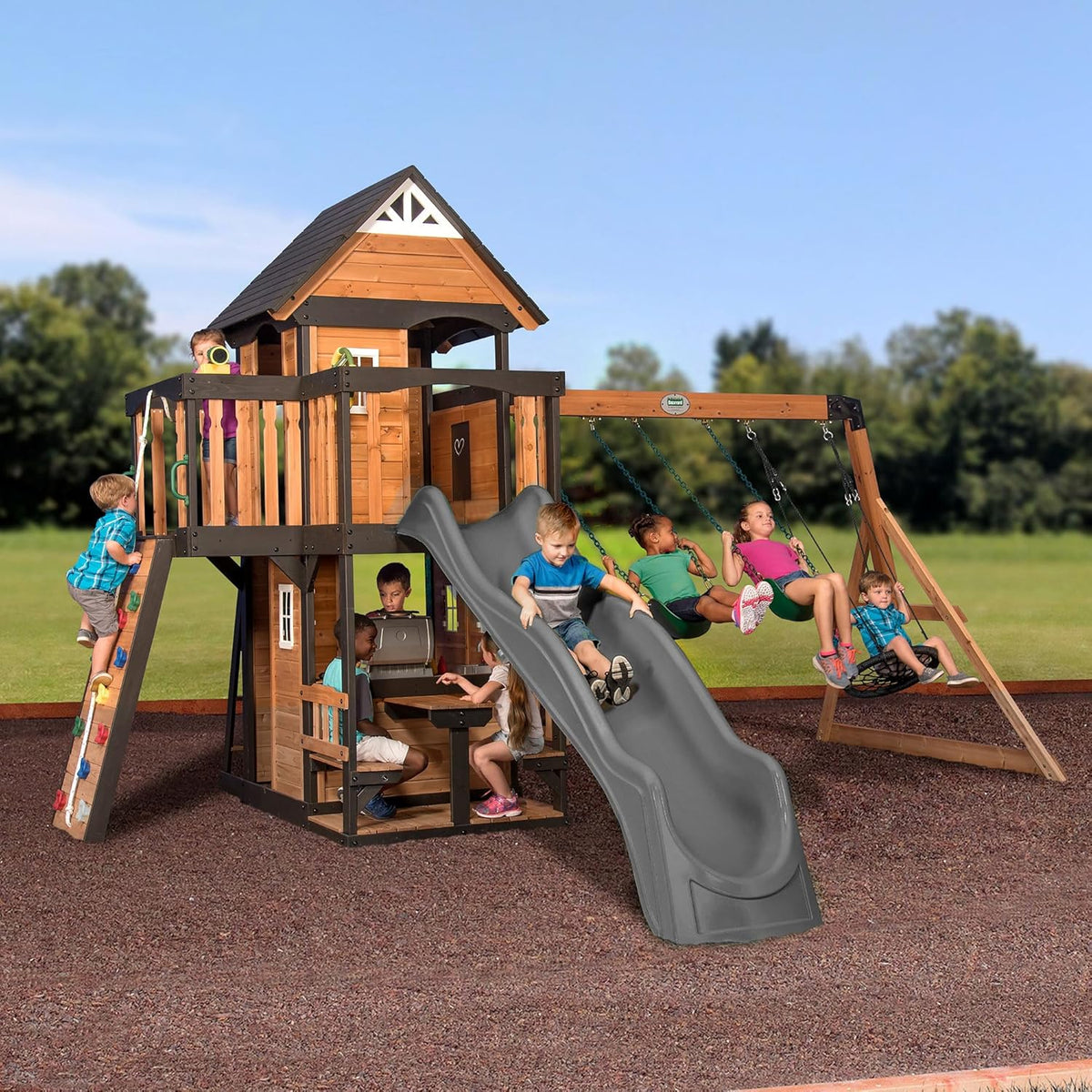 Backyard Discovery Canyon Creek Cedar Wood Swing Set with Wave Slide, Clubhouse, Play Kitchen, Picnic Area, Belt Swings, Web Swing, Rock Wall,
